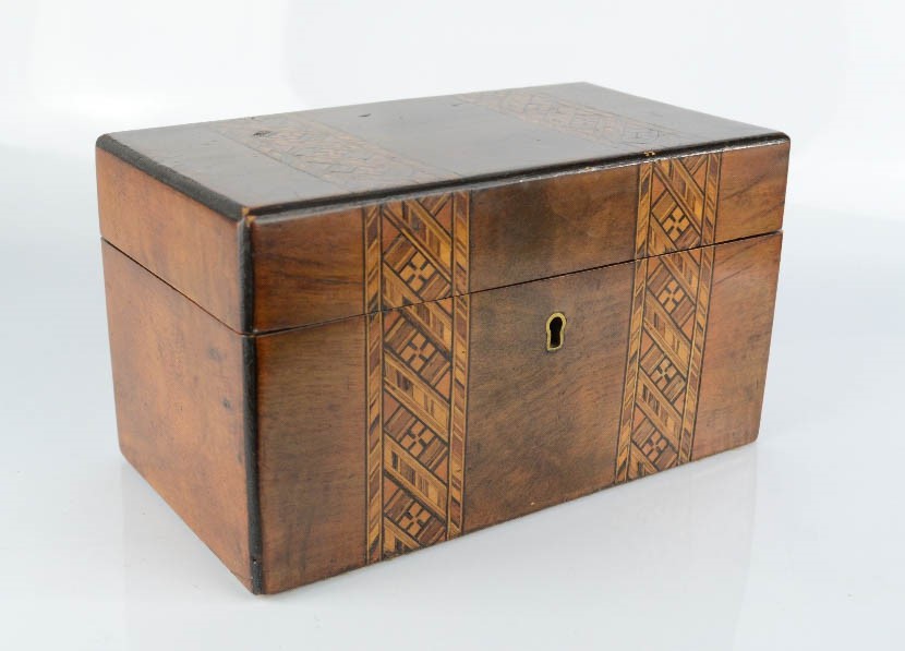 A 19th century tea caddy in burr walnut, with parquetry inlaid bands, 13 by 22cm.