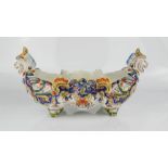 A late 19th century French faience hand painted polychrome grotesque bowl 'Fourmaintraux Freres'