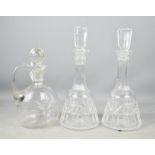 A pair of Waterford crystal decanters, together with a glass jar and stopper.