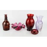 A group of red glassware, murano glass dish, and others.