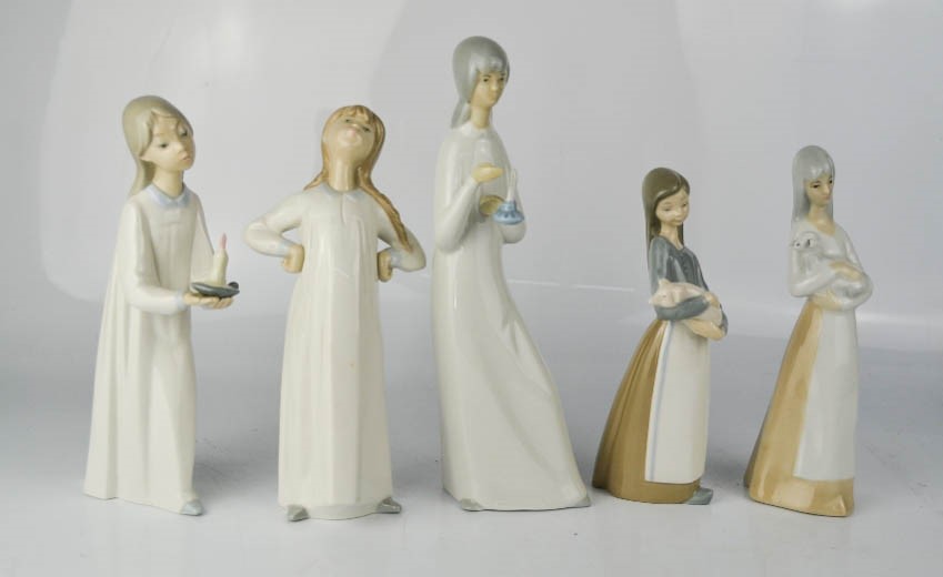 Four Lladro figures together with a Valencia figure of a girl.