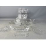 A quantity of crystal including pen holder, dishes, bird, vases and other examples.