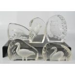 Five Wedgwood crystal paperweights depicting animals.