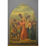 An early 19th century oil on canvas depicting a Station of the Cross, on an arch form frame, 87 by