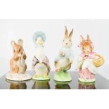 A group of Beatrix Potter figures; Royal Albert No More Twist and Peter Rabbit, Beswick Jemima