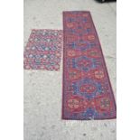 A small Middle Eastern rug and a runner with red ground.