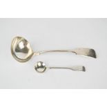 A silverplated ladle, Edinburgh, and a silver sauce spoon.