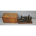 A Naumann German sewing machine in case.