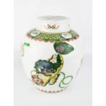 A 19th century Chinese ginger jar, depicting various dragons, 25cm high.