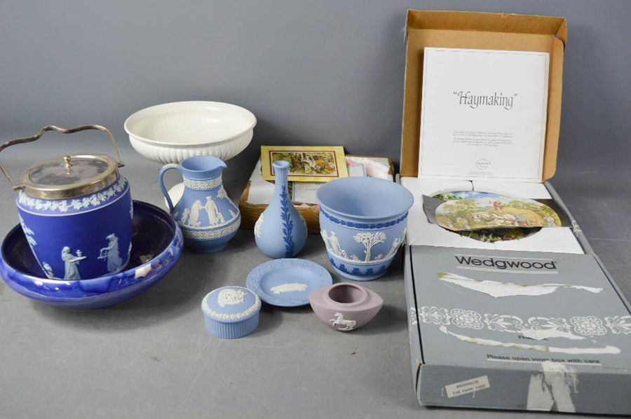 A quantity of Wedgwood collectors plates, Jasperware, fairytale sculptures; rose, iris etc.