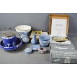 A quantity of Wedgwood collectors plates, Jasperware, fairytale sculptures; rose, iris etc.