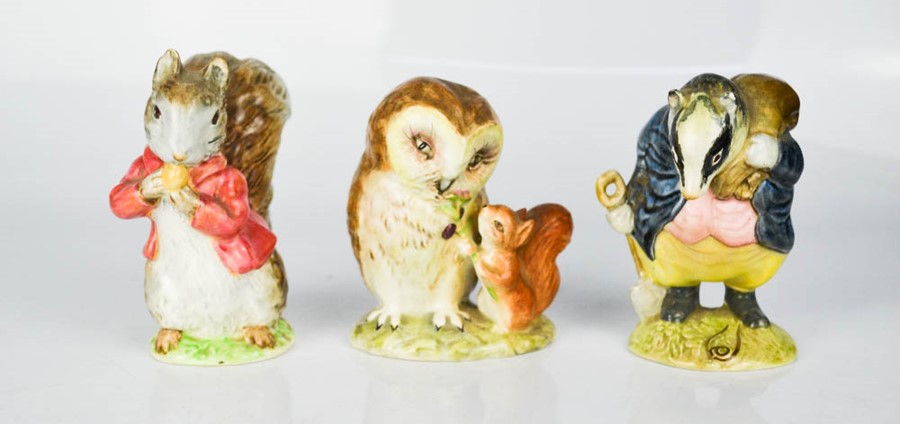 Three Beswick Beatrix Potter figures.