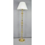 A brass standard lamp and similar table lamp.