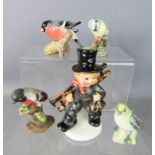 A Goebel chimney sweep, and three Beswick birds.