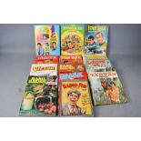 A group of childrens annuals to include basil brush, star trek and others.