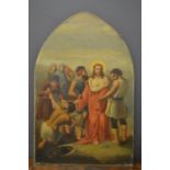 An early 19th century oil on canvas depicting a Station of the Cross, on an arch form frame, 87 by