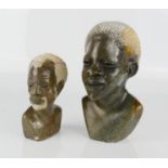 Two soapstone carved African figure heads, 18cm high.