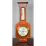 A mahogany cased wall barometer.