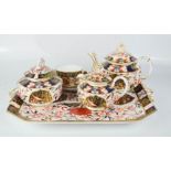An early Derby bachelors tea set, impressed Derby to the base and puce Royal Crown Derby mark.