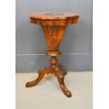 A Victorian burr walnut sewing table, with marquetry inlaid floral decoration, and fitted