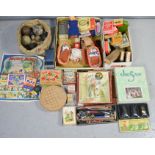 A quantity of vintage games, playing cards, jigsaws, to include solitaire, tiddly winks, dolls,