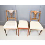 A pair of Edwardian bedroom chairs together with a stool with gingham upholstered drop in seat.