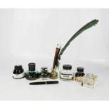 A group of inks, including Parker, Sheaffer, glass inkwell, Montblanc Monte Rosa fountain pen.