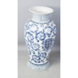 A blue and white armorial vase.