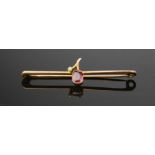 A 9ct gold, pink ruby and seed pearl sweetheart brooch, in the form of a plum and sprig, in the