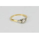 An 18ct gold and diamond ring.