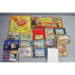 A group of vintage games to include Bagatelle, and jigsaws in 2 boxes.