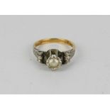 An 18ct gold, platinum and paste ring, size L, 3.3g.