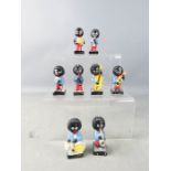 A set of eight original Robinsons Golly Wogs.