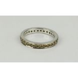 An 18ct white gold and diamond eternity ring, 4.4g.