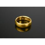 A 22ct gold wedding band, size L½, 6.9g.