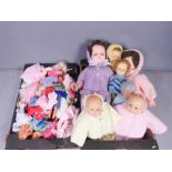 A large group of dolls, dolls clothes, Barbies etc.