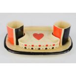 A Royal Doulton playing card suits cruet set, Rd no 763354.