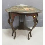 An Edwardian occasional table, ebonised and hand painted to the shaped top to depict a lady and