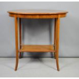 An oval Edwardian mahogany occasional table.