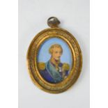 A 19th century miniature portrait of a French officer, 7cm high.