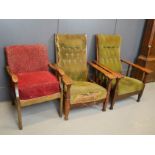 A pair of oak Arts & Crafts style reclining chairs and a single chair.