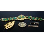 A micromosaic brooch, a 9ct gold tie pin, and small mourning brooch, gilt metal leaf brooch, and a