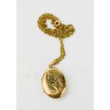 A 9ct gold locket necklace, engraved with the initial S, 7.5g.