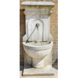 An antique style fibreglass garden fountain.