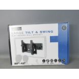 A Titan large tilt and swing 32-42 inch tv wall bracket, brand new.