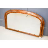 An overmantle mirror, 101 by 57cm.