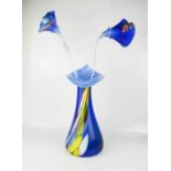 A large Czechoslovakian glass vase, with glass flowers, 51cm high.