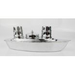 A mid century chrome cruet set in the form of a ship, boxed.