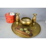 Two brass vases, a collectable tins, brass bowl, brass tray and a vintage fire extinguisher wall