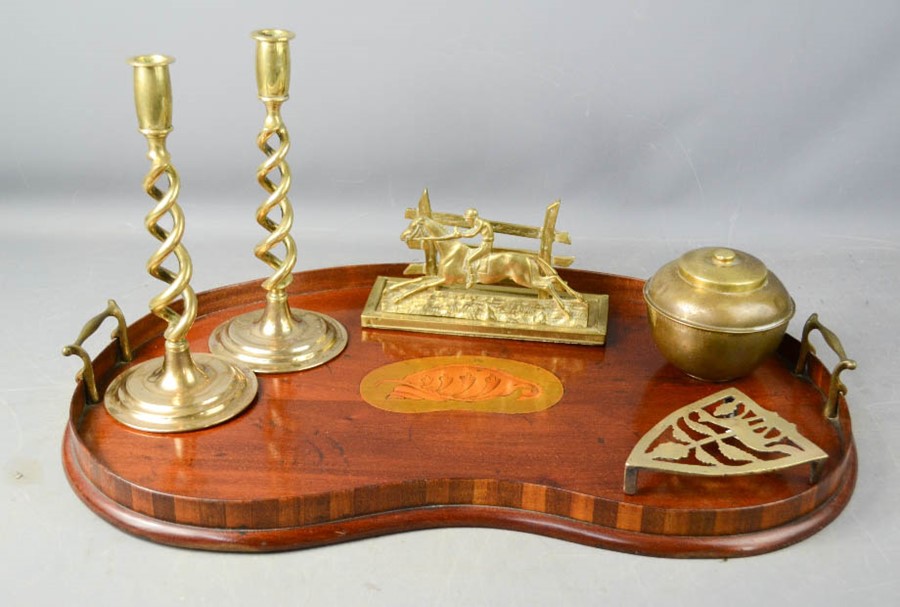 A Victorian wooden kidney shaped tray with brass handles and inlaid shell motif, together with a
